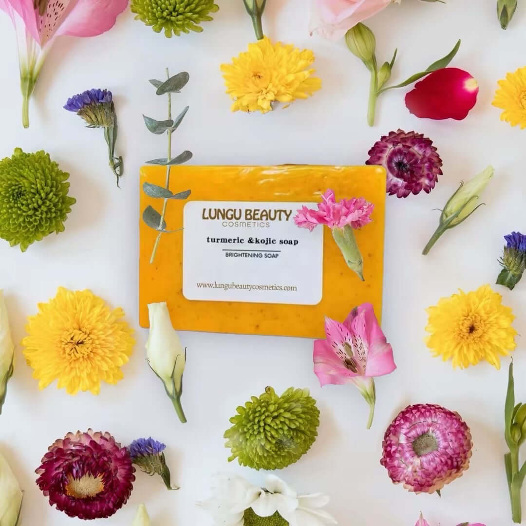 TURMERIC & KOJIC SOAP on a floral background, featuring bright colors and natural ingredients for skin health.