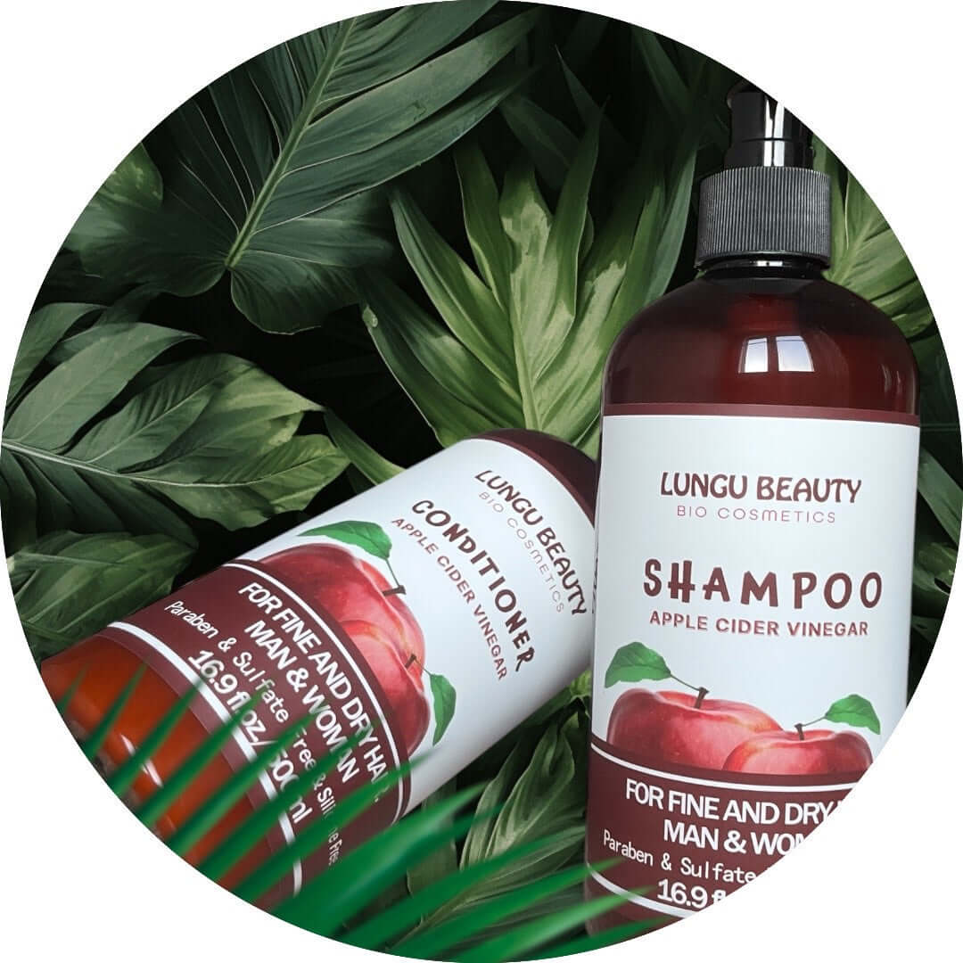 Lungu Beauty Scalp Balance System featuring apple cider vinegar hair care system products on green foliage.